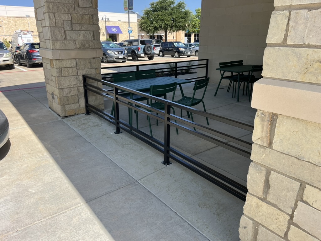 Commercial patio steel railing fabricated for storefront seating area